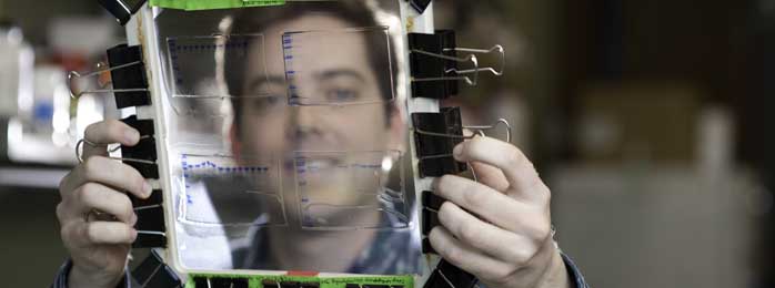 Scientist looking through gel